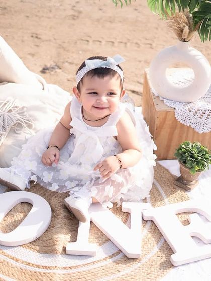A sweet and simple portrait from the boho beach session. The focus is all on her happy expression and the beautiful, soft light.