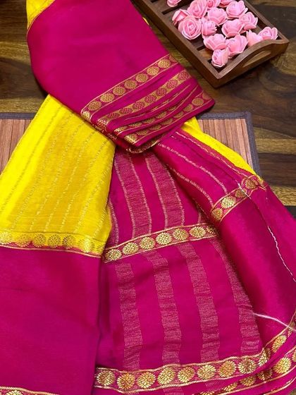 The yellow and pink wrinkle crepe saree, a cheerful and bright option.