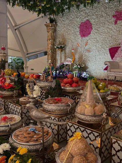 A close-up of the offering table for a lotus-themed engagement.