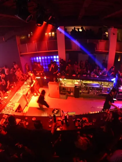Another perspective of the packed night at Tantra, with the crowd surrounding the central bar.