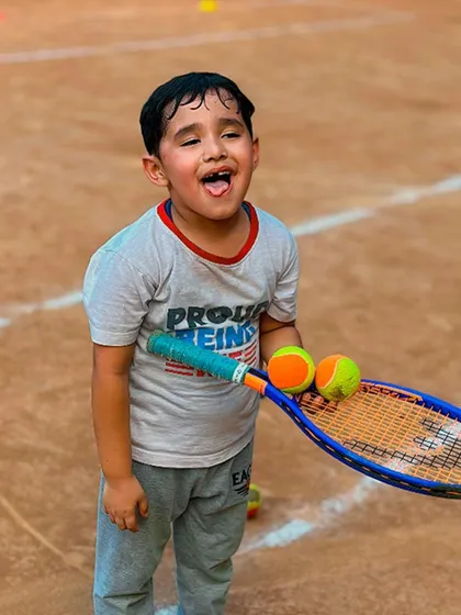 The happy, tired face of a young player after a good training session. This is the look of hard work and satisfaction.