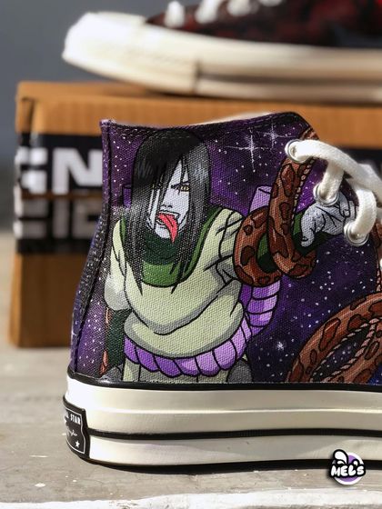 A detailed close-up of the Orochimaru artwork. You can see the fine lines and shading that bring the character's menacing expression to life on this hand-painted Converse.