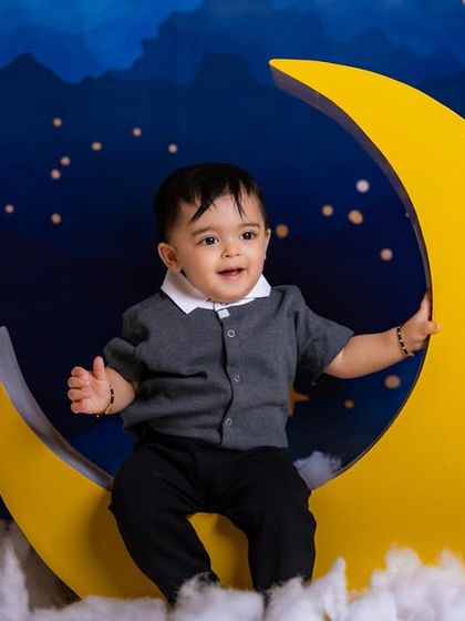 A handsome little man looking dapper on our moon prop.