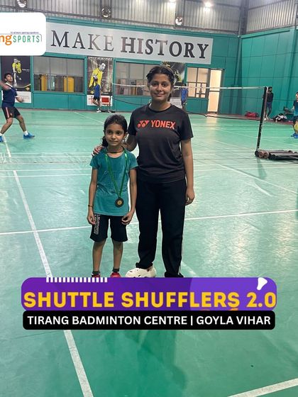 A coach stands with a young winner at the Shuttle Shufflers 2.0 tournament. Our coaches are there to guide and support our players every step of the way, in training and in competition.