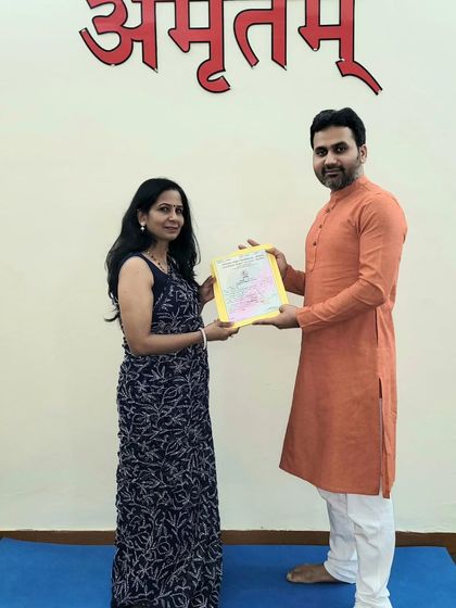 This student now holds her 'Yogacharya' certificate, ready to guide others. Her dedication throughout the course was exemplary.