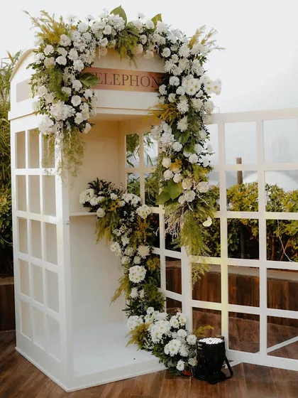 We believe in creating interactive memories. This vintage-style telephone booth is our unique audio guestbook, allowing guests to leave heartfelt recorded messages for the couple, creating a keepsake more personal than a written note.