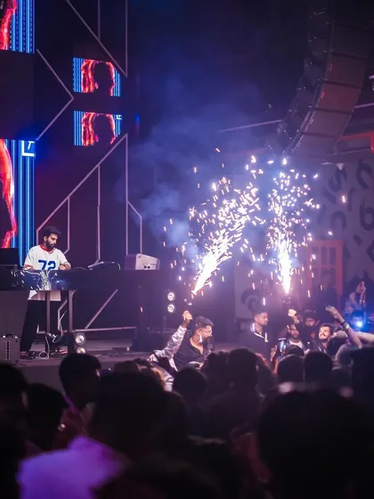I believe in a full sensory experience. My shows include a complete audio-visual setup with special effects like these cold pyro sparklers to make the key moments unforgettable. It’s all about creating that 'wow' factor.
