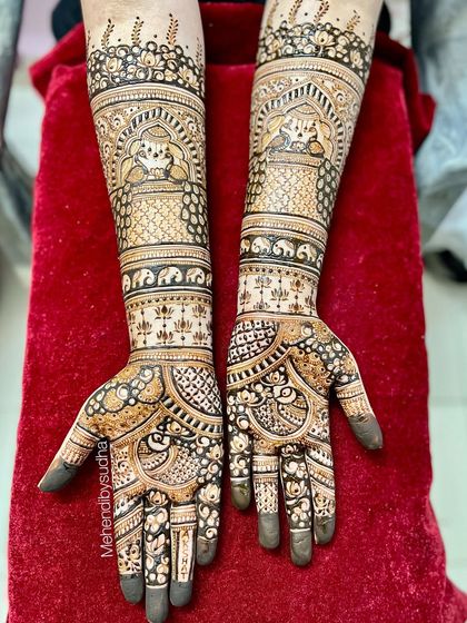 A slightly different perspective of the jharokha and elephant bridal mehendi, emphasizing the clean lines and symmetrical layout.