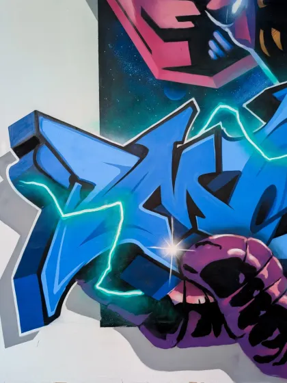 A close-up on the graffiti letters in my Galactus mural. I added a glowing effect to make it look like they are crackling with cosmic energy.