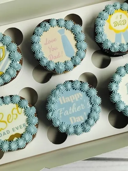 This is another one of my Father's Day designs, featuring a softer blue and yellow color palette. The edible toppers include messages like "No. 1 Dad" and "Best Dad Ever," offering a different style to celebrate your father.