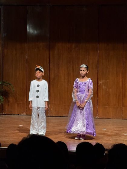 Olaf and Rapunzel, an unlikely but delightful pair, performing their scene together.