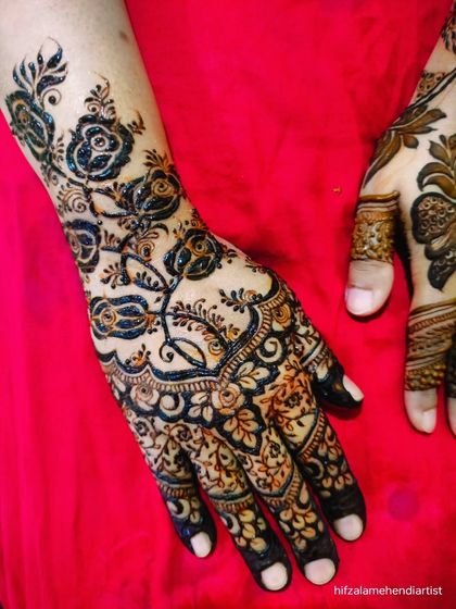 Another shot of the trending dark rose design, showing the full pattern on the back of the hand.