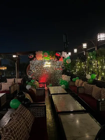 A wide view of the terrace setup, showing how I can decorate outdoor restaurant spaces for private parties.