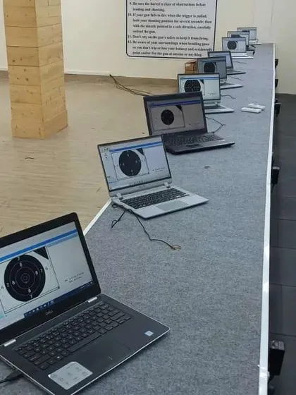 A key part of my service is the complete technical setup. This shows a row of SIUS electronic targets fully installed and connected to lane displays, providing real-time, accurate scoring for a professional tournament experience.