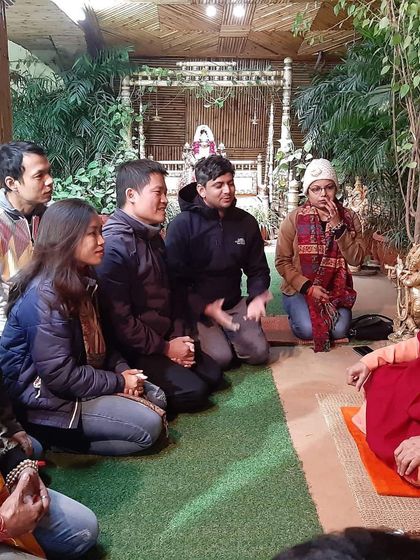 Our retreat group from Vietnam in a satsang (spiritual discourse) with a revered sage at the Parmarth Niketan ashram in Rishikesh. These interactions provide deep insights into yogic philosophy.