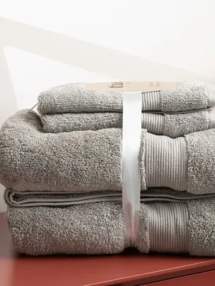A set of grey towels, showing another color option for the customer. Clear and consistent product photos help increase online sales.