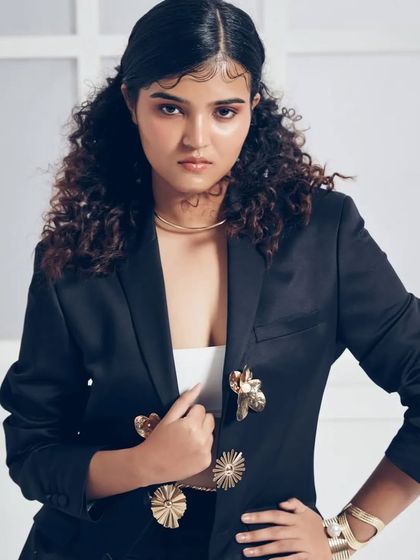 A closer portrait that highlights the glowing skin and soft glam makeup. This look is about creating a healthy, radiant complexion that looks natural yet perfected, a key skill for any commercial makeup artist.