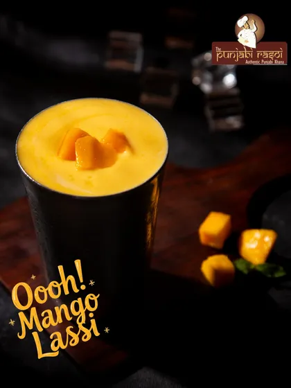After a hearty Punjabi meal, nothing is more refreshing than our Mango Lassi. We blend thick, fresh yoghurt with sweet mango pulp to create this classic drink. It is the perfect way to cool down and complete your feast.