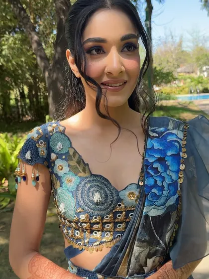 A beautiful smile from this Kiara Advani lookalike. The makeup enhances her features and gives her a radiant, happy glow.