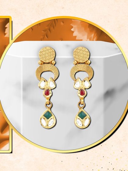 These modern drop earrings feature a mix of coloured stones and white enamel, embodying a chic and contemporary style that is always in demand.