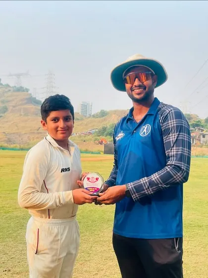 Presenting the Player of the Match award to Shlok Mao for his outstanding performance.