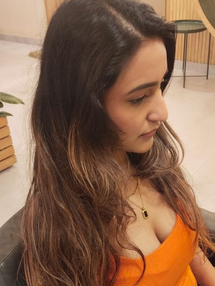 The beautiful result of a balayage treatment. Notice how the lighter tones are hand-painted to create a gradual, natural-looking effect with a soft grow-out.