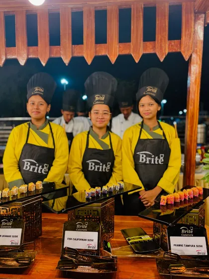 Our team of sushi chefs, in their custom Brite uniforms and hats, stand ready to serve. Their coordinated appearance adds to the professionalism of the live station.