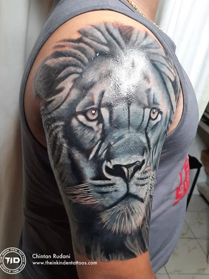 Another angle of the lion cover-up tattoo.