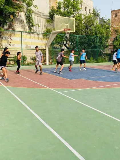 A line of players begins a running drill, showing the discipline and structure of our fitness sessions.