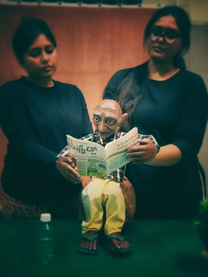 Our team carefully rehearsing with the 'Popo' puppet. Every detail, from his expression to his posture, is perfected for the performance.