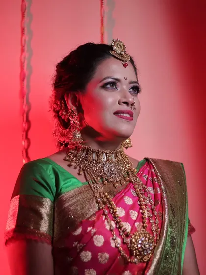 A beautiful portrait under dramatic lighting, showing how the makeup looks stunning in different lighting conditions.