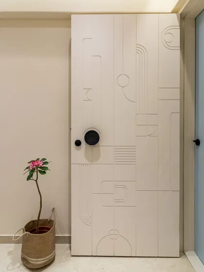 The safety door was designed to be a piece of art in itself. The modern, minimalist pattern was created to be unique and memorable, setting this Mumbai home apart.