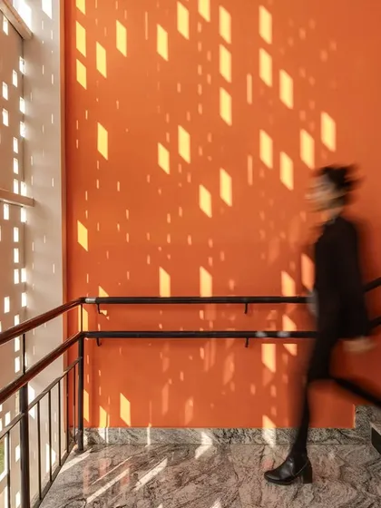 This image from a feature on Vidyashilp Academy highlights how the design embodies the principles of UNESCO’s Happy Schools Initiative. The use of 'jali' screens for natural light and ventilation creates a positive and uplifting learning environment.