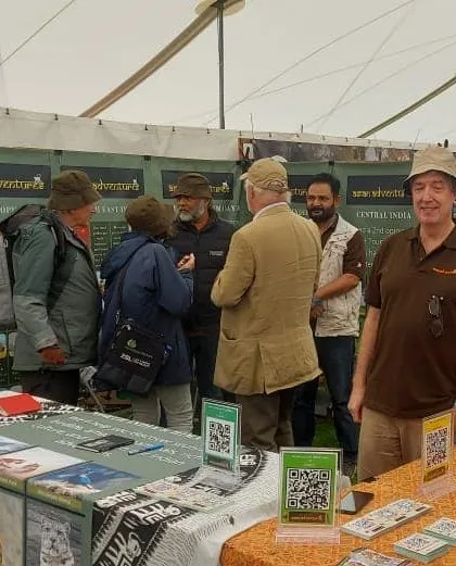 Our team engaging with a group of interested visitors at the Global Birdfair. We are always excited to discuss our diverse range of tours, from Himalayan birding to Central India tiger safaris.