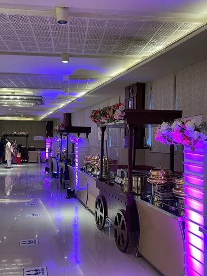 No event is too big for us. This is our elegant buffet setup at Samriddhi Banquets, showcasing our ability to handle large-scale receptions and corporate functions. Our presentation is designed to impress your guests from the moment they arrive.