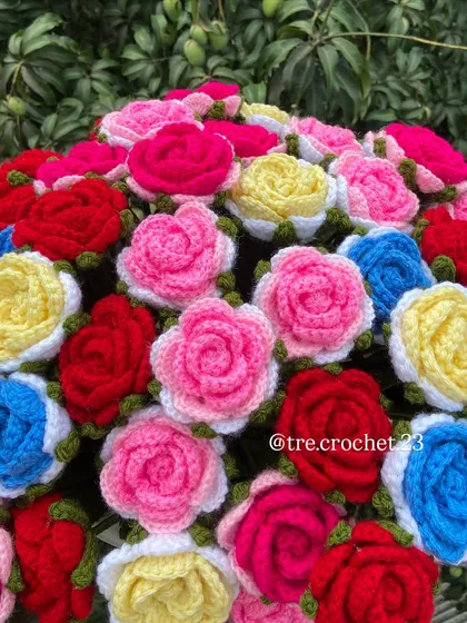 A close-up of a large, multi-colored rose bouquet.