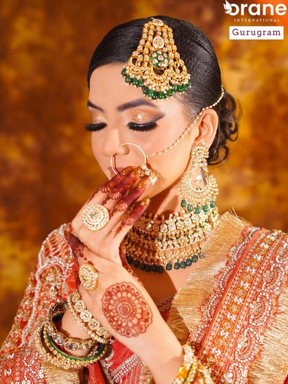 A stunning final shot of an Arabic bridal look created by a student. Notice the sharp winged eyeliner and bold jewelry, key elements I teach in my specialized bridal makeup modules.