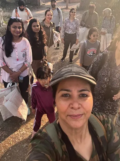 The whole group, including kids, ready for a morning of birding and cleaning. Our events are a great way for families to spend quality time in nature.