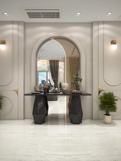 An elegant entryway concept with an arched mirror and a sculptural console table. The design uses wall paneling and subtle lighting to create a grand and welcoming first impression.