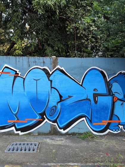 A quick and simple sticker-style piece featuring Stitch. This shows how I can create smaller, fun character art that feels like a giant sticker slapped on the wall. It's a playful style perfect for any space.