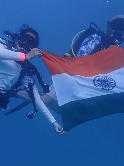 Two divers perfectly poised with the Indian flag. This underwater flag hoisting was a highlight of our 75th Independence Day celebrations in the Maldives.