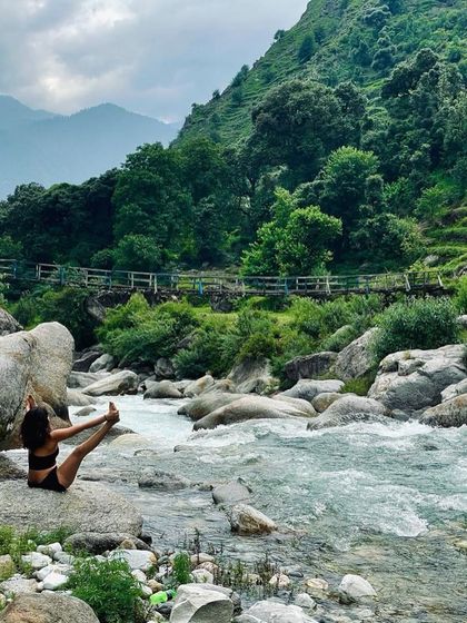 "I am the mountains, I am the rivers." A moment of deep connection with nature, practicing by a flowing stream. This is a reminder that we are all part of the same universal energy.