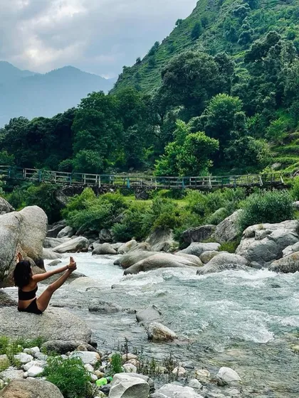 I am the mountains, the rivers, the city lights. Yoga teaches me to accept all aspects of myself and life. This pose, Upavistha Konasana (Wide-Angled Seated Forward Bend), by a mountain stream, is a moment of surrendering to that oneness.