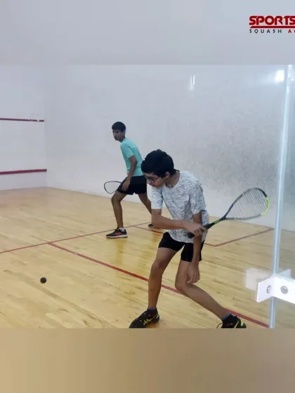 An action shot from the squash tournament, capturing the intensity and athleticism of the sport. My events are designed to capture the dynamic nature of every game.