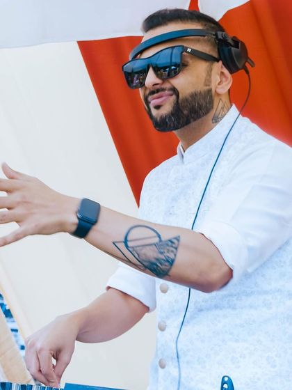 Another angle of my performance during the Mehendi ceremony, showing my focus and control over the music and the crowd's energy.
