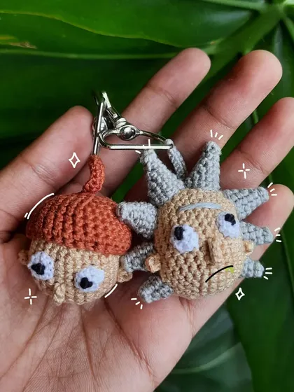 Wubba lubba dub dub! I had a blast making this custom set of Rick and Morty keychains. Their expressions were so much fun to recreate with yarn.
