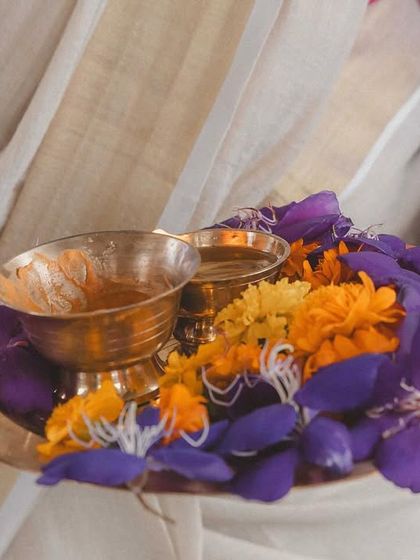 A warm, traditional welcome for guests arriving at a destination wedding. We greet them with a tilak and locally sourced flowers to make them feel special from the moment they arrive.