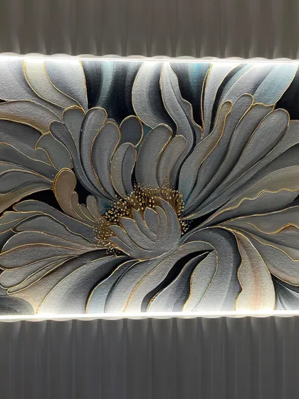 A close-up of the grey and gold flower, showing the delicate brushstrokes and gold leaf details.