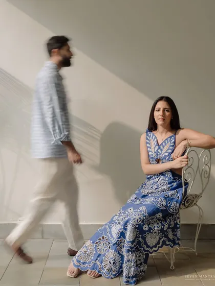 An artistic shot using motion blur to create a sense of fleeting moments. This shows our creative approach to capturing the dynamic between a couple even in a simple setting.