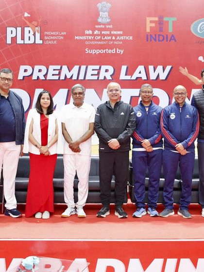 A group photo with dignitaries and players at the badminton league. Their encouragement was a great motivation for all the teams.